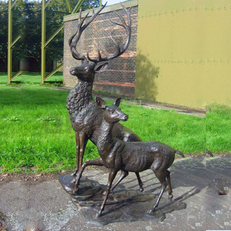 Wow, look, two elk fighting a bronze statue